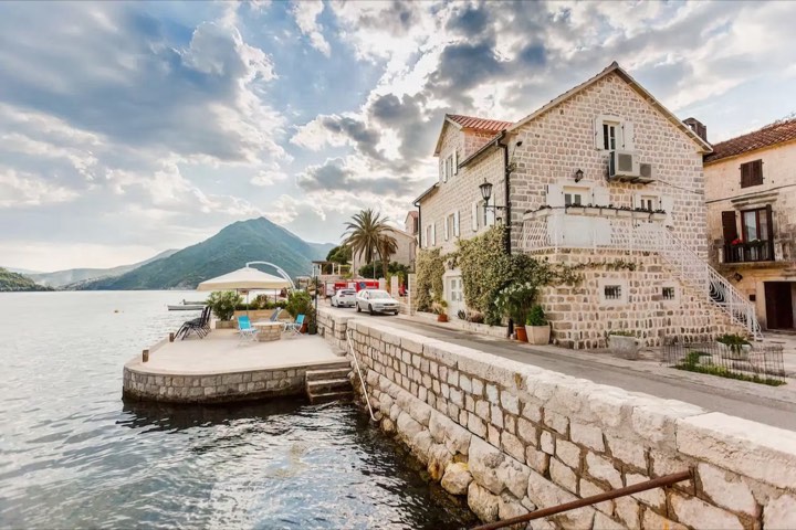 Our stone house on the water