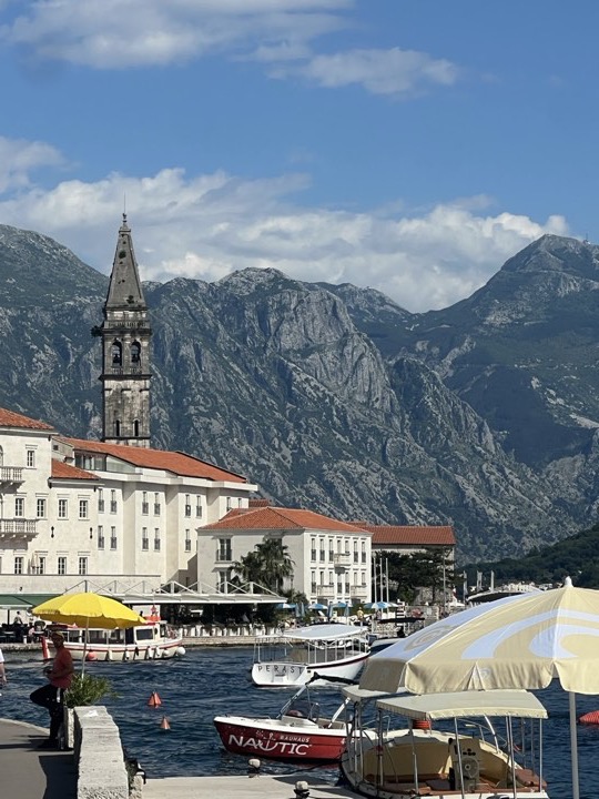 Perast's bell tower and waterfront seen from the pontoon
